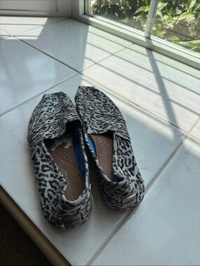 TOMS Black and White Leopard Print Canvas Slip-Ons